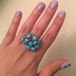 Adjustable evil eye ring